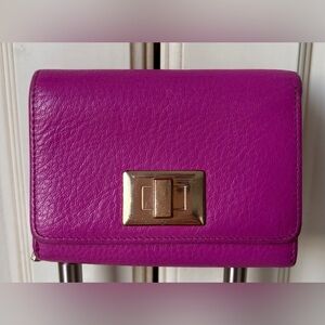 Danier Magenta Leather Wallet with Gold Accent. Trifold.